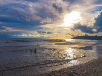 Scenic view of sea at sunset
