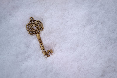 High angle view of cross on snow