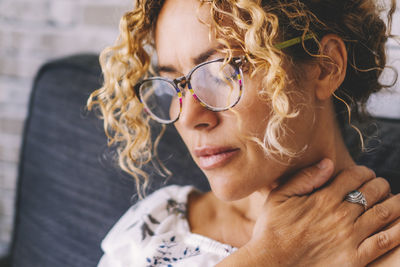 Portrait of young woman wearing sunglasses