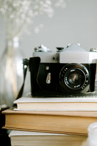 Close-up of camera on table