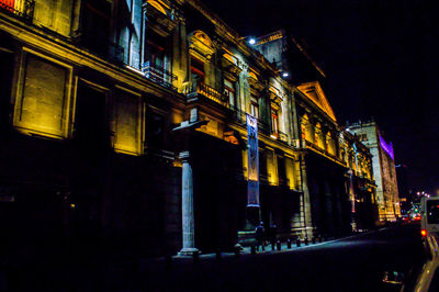 Illuminated building at night