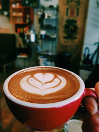 Close-up of cappuccino on coffee