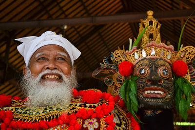 Close-up portrait of man wearing mask