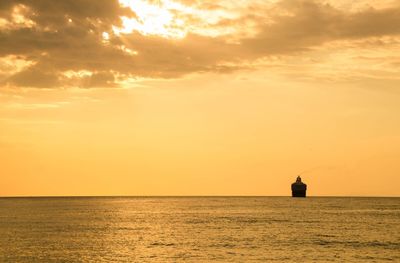 Scenic view of sea at sunset