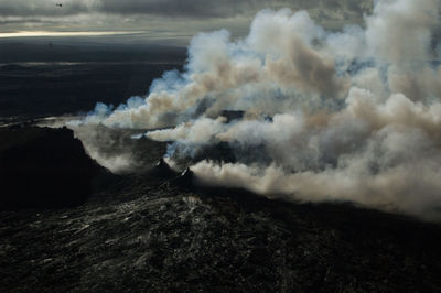 Panoramic view of volcanic landscape and sea