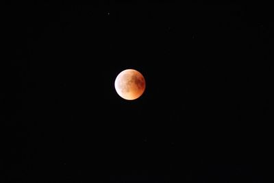 Full moon against clear sky at night