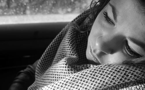 Close-up of woman wearing hat
