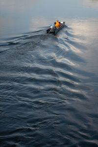 High angle view of man surfing in sea