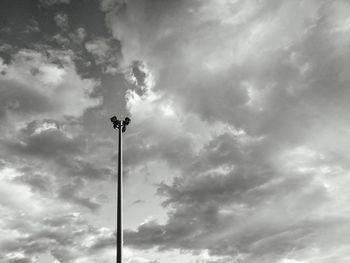 Low angle view of floodlight against sky