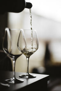 Close-up of wineglass on table