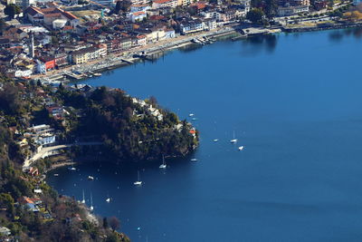 High angle view of buildings by sea