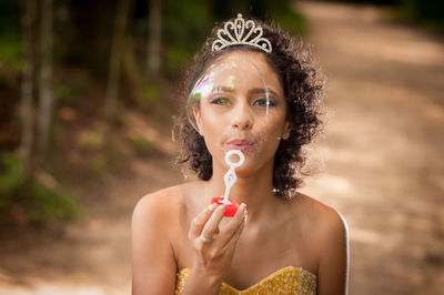 Portrait of woman eating ice cream