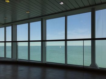 Sea seen through glass window
