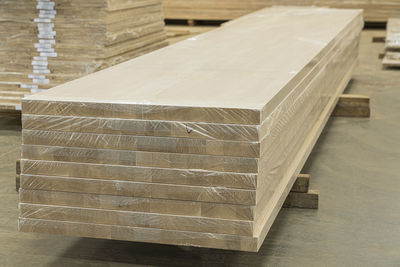 Oak furniture boards in the warehouse of woodworking production