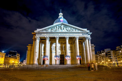 Low angle view of statue at night