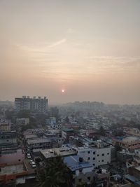 High angle view of townscape against sky during sunset