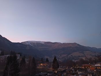 View of town with mountain range in background