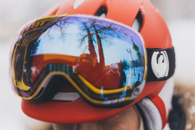 Close-up of man wearing sports helmet