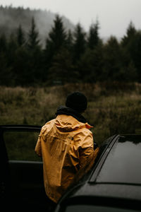 Rear view of man in car