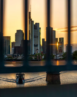 View of buildings in city during sunset