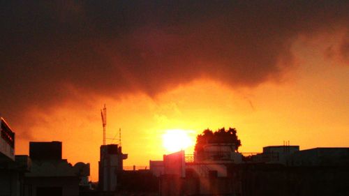 Silhouette of buildings at sunset