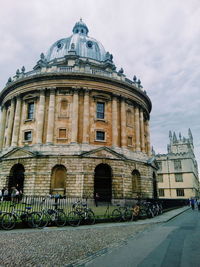 View of historical building against cloudy sky