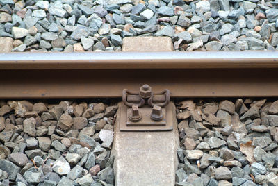 High angle view of stones on railroad track
