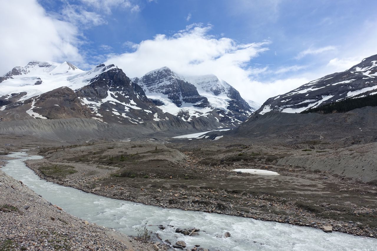 mountain, sky, environment, landscape, snow, beauty in nature, cloud - sky, cold temperature, winter, scenics - nature, nature, mountain range, day, tranquil scene, no people, snowcapped mountain, wilderness, tranquility, outdoors, mountain peak