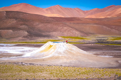 Person riding in desert