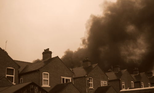 Low angle view of houses against sky