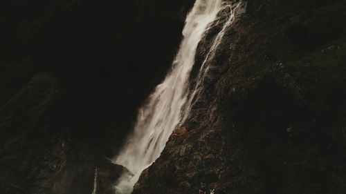 Scenic view of waterfall at night
