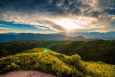 Scenic view of landscape against sky during sunset