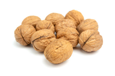 Close-up of fruits against white background