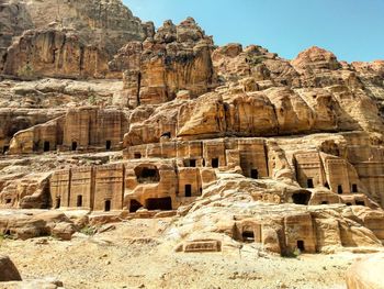 Ruins of building against cloudy sky