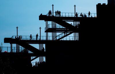 Silhouette of built structure against clear sky