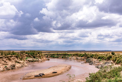 Scenic view of land against sky