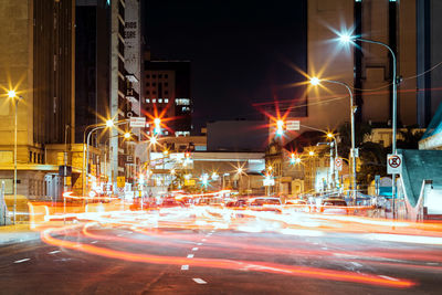 Light trails on city street at night