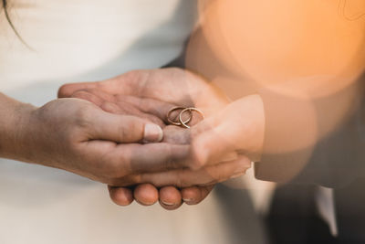 Close-up of woman holding hands