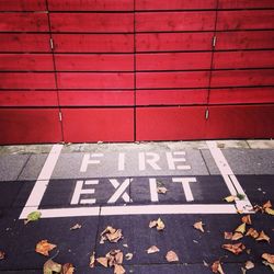 Fire exit of red wooden building