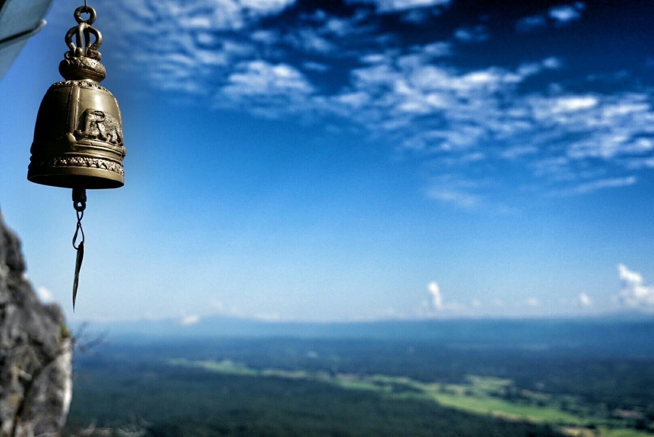 sky, cloud - sky, landscape, tranquility, scenics, nature, guidance, blue, tranquil scene, beauty in nature, cloud, mountain, outdoors, day, no people, low angle view, communication, direction, copy space, dusk