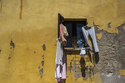 Clothes drying against building