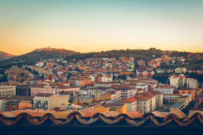 High angle view of townscape against sky during sunset