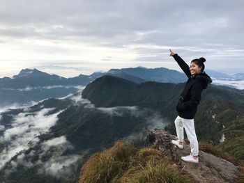 Full length of man standing on mountain