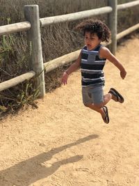 Full length of boy running