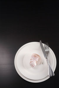 High angle view of cake in plate on table