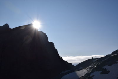 Scenic view of mountains against clear sky