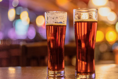 Close-up of beer glass on table