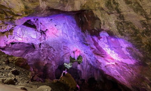 Low angle view of purple cave