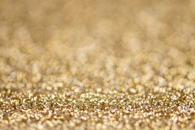 Full frame shot of gold glitter texture