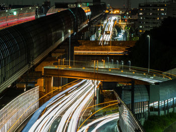 High angle view of illuminated bridge at night